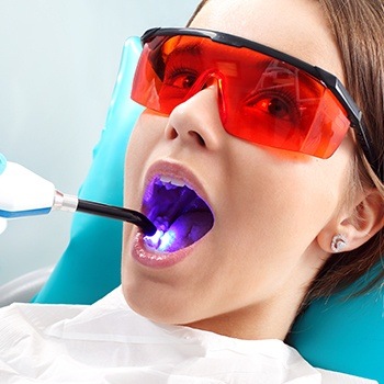 Young girl receiving dental sealants