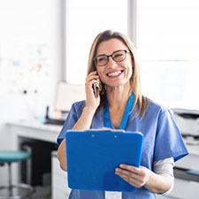 dental hygienist talking on the phone 