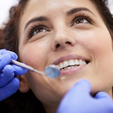 Closeup of woman with dental implants in Allen smiling