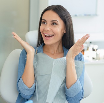 Woman showing off smile after gum disease treatment