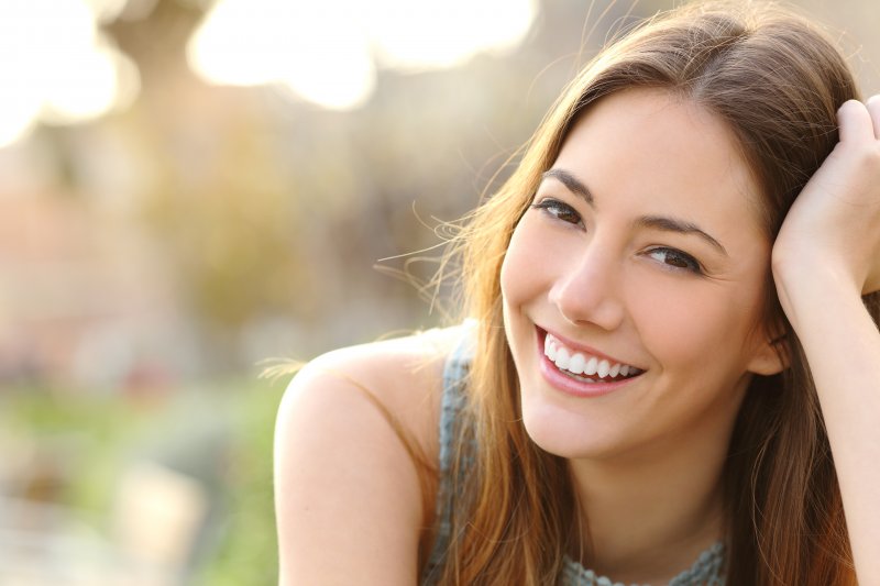 Young woman smiling.
