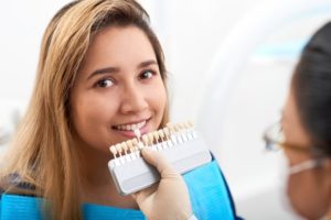 Patient receiving veneers from her dentist.