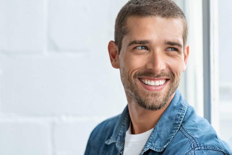 person smiling after undergoing cosmetic dentistry