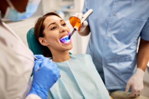 a patient visiting her dentist for a filling 